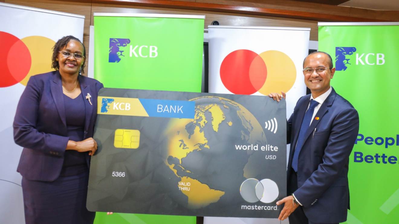 KCB Bank Kenya Managing Director, Mrs. Annastacia Kimtai (Left) & Shehryar Ali, Mastercard Senior Vice President and Country Manager for East Africa and Indian Ocean Islands (Right) during the launch of the Exclusive World Elite Card. PHOTO/COURTESY